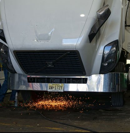 Work under way on the front end of a Volvo tractor in the Manchester shop